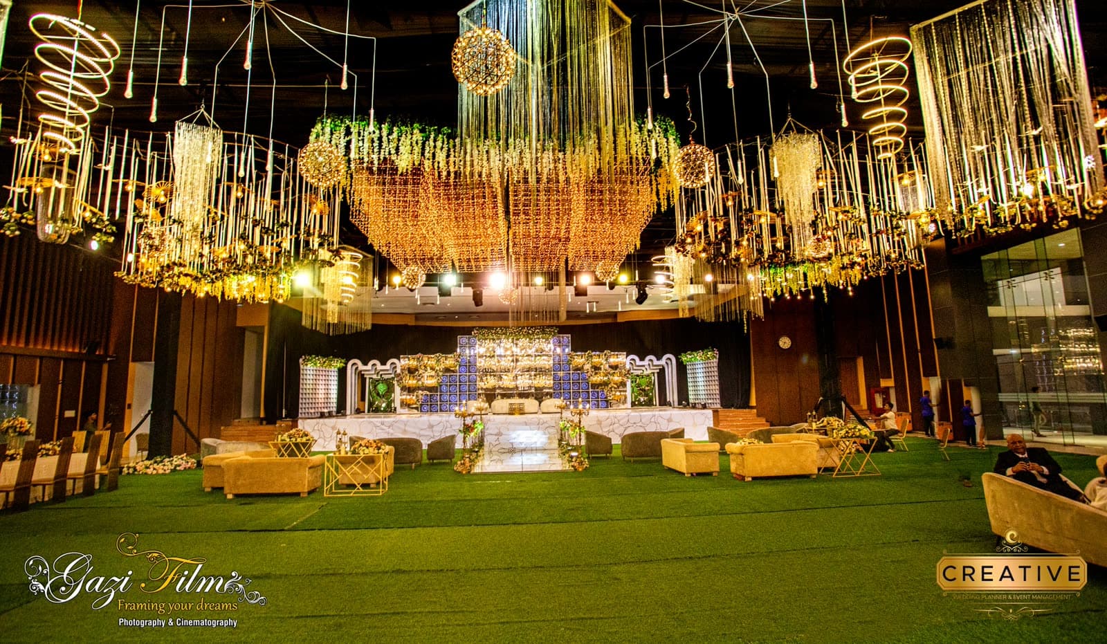 Interior & Venue Decor: Hall with golden hanging installations